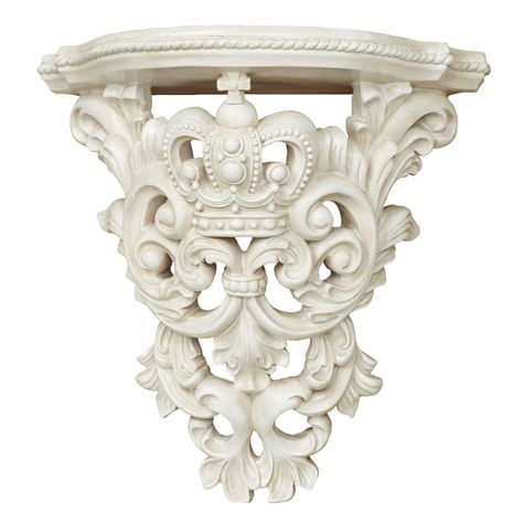 PRICES MAY VARY. Traditional polystone floating wall shelf Has an openwork design Features crown, srolls, acanthus leaves, and rope trim Has an antique white finish Measures 11 inches wide x 6 inches deep x 10.5 inches high The Crown Imperial Antique White Wall Shelf royally displays your items with regal flair. The openwork polystone accent features a crown, scrolls, acanthus leaves, and rope trim. Measures 11"Wx6"Dx10.5"H. Small Victorian Cottage Interior, French Victorian Decor, Victorian Cottage Interior, Victorian Shelves, White Wall Shelf, Vintage Shelves, Crown Imperial, Shelves For Bedroom, White Wall Shelves