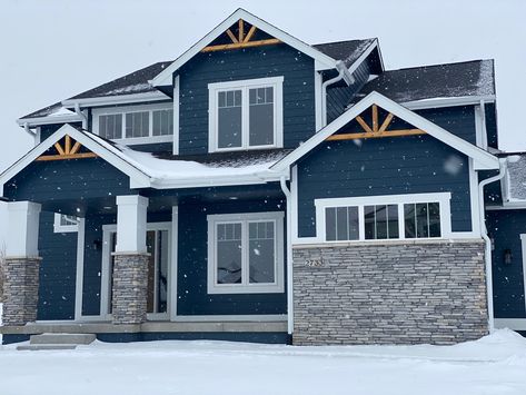 Navy And Gray House Exterior, Blue And White Craftsman House, Dark Navy Blue Siding House, Gray And Navy Exterior House Colors, Blue Exterior House Colors With Wood, Blue House Ideas Exterior, Navy Blue Lake House Exterior, Navy House Exterior With Stone, Blue Wood Siding Exterior