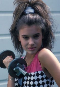 Alyssa Milano 80s Hair Half Up Half Down, 80s High Ponytail, 80s Half Up Half Down, 80s Hair Ponytail, 80s Half Up Half Down Hair, 80s Workout Hair, 80s Ponytail Hairstyles, 80s Hair Scrunchie, Chicago 80s