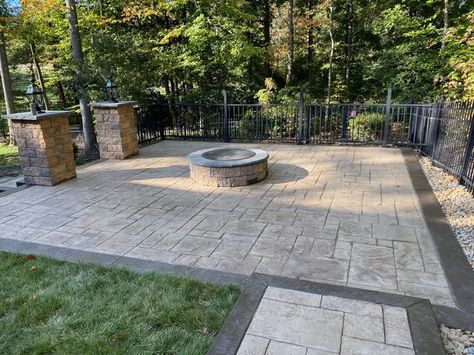 25 Inspiring Stamped Concrete Patio Ideas and Designs | Hunker Stamped Concrete Patio Ideas, Wood Stamped Concrete, Stamped Concrete Patio Designs, Poured Concrete Patio, Concrete Patio Ideas, Patio Ideas On A Budget, Natural Stone Fireplaces, Concrete Patio Designs, Paver Designs