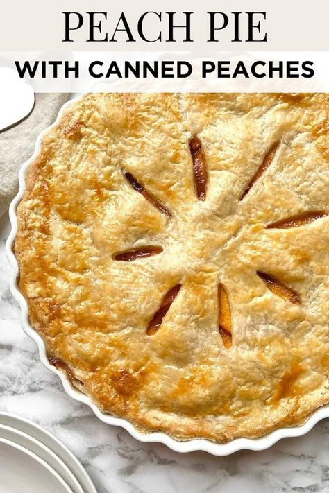 This fresh peach pie recipe is made with a homemade flaky pie crust that's baked to perfection with a sweet peach pie filling made from canned peaches, sugar, cinnamon, nutmeg, vanilla extract, and lemon juice. Save for later! Southern Peach Pie Recipes, The Best Peach Pie, Peach Pie With Jarred Peaches, Peach Apple Pie, Peach Pie Recipes Easy, Best Peach Pie, Perfect Peach Pie, Best Peach Pie Recipe, Peach Pie Filling Recipes