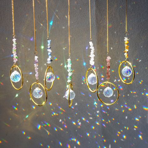 PRICES MAY VARY. Healing Crystals Suncatcher - Bring some rainbows into your space with this sun catcher featuring one bar of natural birthstone crystals and one 20mm crystal glass prism.Packed with 7pcs, each length is about 12.2inch,weight is 185g/set Rainbow Maker - When you hang your sun catcher near a sunny window, it will fill the room with beautiful flecks of colorful light. It's a perfect year-round addition to any space, but also provides a wonderful little pick me up for the winter blu Christmas Suncatchers, Window Prism, Beaded Christmas Decorations, Home Garden Wedding, Window Suncatchers, Plant Jewelry, Ball Decorations, Hanging Crystals, Rainbow Maker