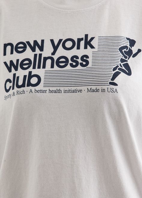 All about health and wellness, Sporty & Rich is the Los Angeles-based label that prides itself on sustainability, quality and a distinct '90s-inspired sports aesthetic. Crafted from cotton, the USA Wellness Club T-Shirt is adorned with a printed 'New York Wellness Club' slogan across the chest. - Garment-dyed cotton - Crew-neckline- Printed 'New York Wellness Club' slogan on front - Short sleeves - Relaxed fit Materials:100% Cotton. Care:Cold machine wash. Sizing: Item fits true to size. Model w Sports Clothes Aesthetic, Sporty And Rich Shirt, Marathon T-shirt, Sporty And Rich Tshirt, Sporty And Rich Wellness Club, Run Club Shirt, Sporty & Rich, Wellness Merch, Sports Club Design