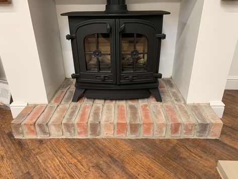 Brick Stove, Fireplace Floor, Fireplace Showroom, Stove Design, Chimney Repair, Brick Hearth, Mantel Decor Ideas, Wood Stove Fireplace, Fireplace Logs