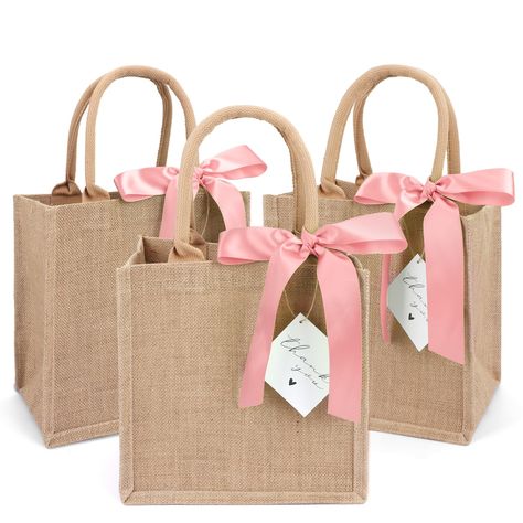 PRICES MAY VARY. ✔ PACKAGE INCLUDES - 3 burlap tote bag,3 pink silk ribbon and 3 thank you card. You can use these silk ribbon and thank you card to decorate them as burlap gift bags for your parties! ✔DURABLE AND REUSABLE - The burlap bag is made of 100% natural jute, so they are great for the environment. Thickened jute(450gsm thickness) makes them stronger，durable and reusable. ✔ MEDIUM SIZE BUT LARGE CAPACITY - Approximately 9.8 x 9.8 x 7in. Perfect size to hold various items of daily use, d 21st Birthday Gift Bags For Guest, Bachelorette Beach Party, Guest Basket, Bachelorette Bags, Bachelorette Gift Bags, Bachelorette Beach, Lemongrass Spa, Burlap Gift Bags, Burlap Tote Bags