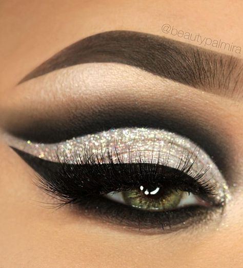 33. Beautiful shimmery gold Add a sparkly to your look with eye makeup like this! Here we have shimmery gold eyelids and long lashes.... Makeup For Parties, Glittery Eye Makeup Tutorial, Glitter Eye Makeup Tutorial, Glitter Eyeshadow Tutorial, Black And Silver Eye Makeup, Glitter Cut Crease Makeup, Sparkly Eye Makeup, Makeup For Weddings, Glitter Cut Crease