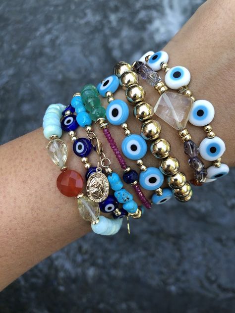 Blue Eye Bracelet - Jugar N Spice Bracelet Set Ideas, Blue Eye Bracelet, Dainty Moon Necklace, Jewel School, 2023 Moodboard, Fork Jewelry, Micro Mosaic Jewelry, Eye Bracelets, Asymmetrical Earrings