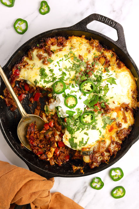 These breakfast enchiladas, baked to perfection in a cast iron skillet, are filled with fluffy eggs, savory sausage, melty cheese, and topped with a rich enchilada sauce. Just pop it in the oven, let the flavors meld together, and you’ve got a deliciously cozy breakfast that’s sure to bring everyone to the table. 

Get the recipe at ORDairy.org! Holiday Gathering Food, Mexican Breakfast Skillet, Mexican Skillet, Egg Bakes, Breakfast Skillet Recipes, Gf Meals, Romantic Breakfast, Breakfast Enchiladas, Gf Breakfast