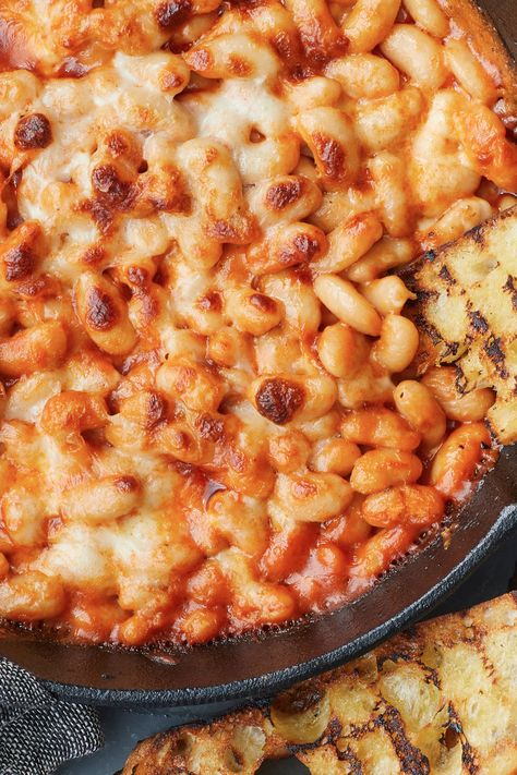 Cheesy White Bean-Tomato Bake Recipe - NYT Cooking Baked Tomato Recipes, White Bean Recipes, Oil Making, Baked Tomatoes, Giada De Laurentiis, Nyt Cooking, White Bean, Meatless Meals, Bean Recipes