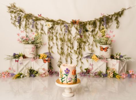 Floral Garden Cake Smash, Flower Smash Cake First Birthdays, Wild Flower Birthday Decorations, Flower Smash Cake Photoshoot, Wildflower First Birthday Party Decor, Wildflower Cake Smash Photoshoot, Plant First Birthday Party, Wildflowers First Birthday, Whimsical Cake Smash