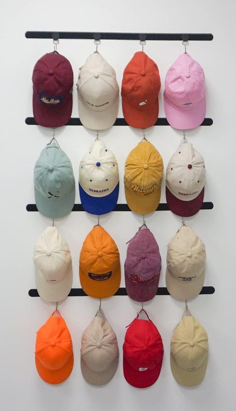 PRICES MAY VARY. Strong Metal Hooks Hold Up to 64 Hats: Comes in a pack of 16 hooks. Each hook can hang up to 4 baseball caps. An ideal solution for any hat lover looking for a new way to organize and display their collection. Keep hats organized and secured, preventing them from getting damaged or crushed More Scenario Applicable: No nails or screws required. Simply peel off the adhesive backing and stick the strap to any desired surface, such as the wall, over the door and closet. Upgraded str Wall Hat Hanger, Baseball Hat Collection Display, Ways To Hang Hats On Wall, Hats On Wall Bedroom, Wall Of Hats, Baseball Hat Wall Display, Hats On Wall Display, Cap Wall Display, Beanie Display