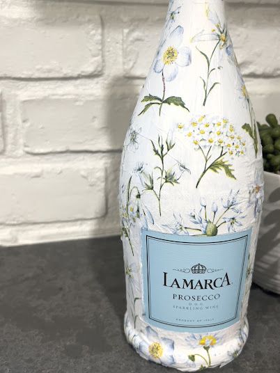 Decoupage prosecco bottle Decopage Ideas Wine Bottles, Mod Podge Champagne Bottle, Champaign Bottle, Prosecco Bottle, Paper Vase, Navy And White Dress, Hodge Podge, White Acrylic Paint, Event Coordinator