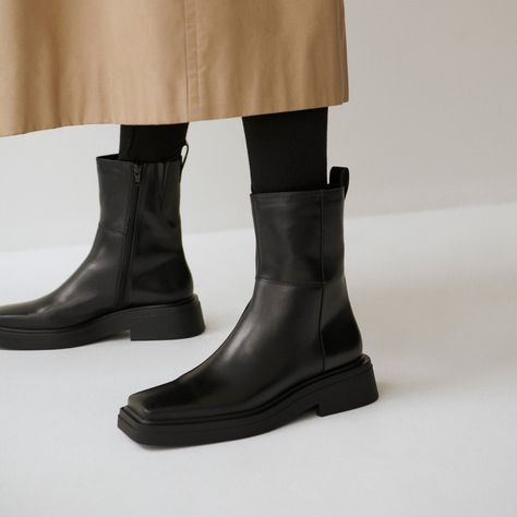 Vagabond Shoemakers on Instagram: “Mid-calf boots Eyra brings a minimalistic, timeless touch. Crafted in black leather, the sleek upper is complemented with detailed seams…”