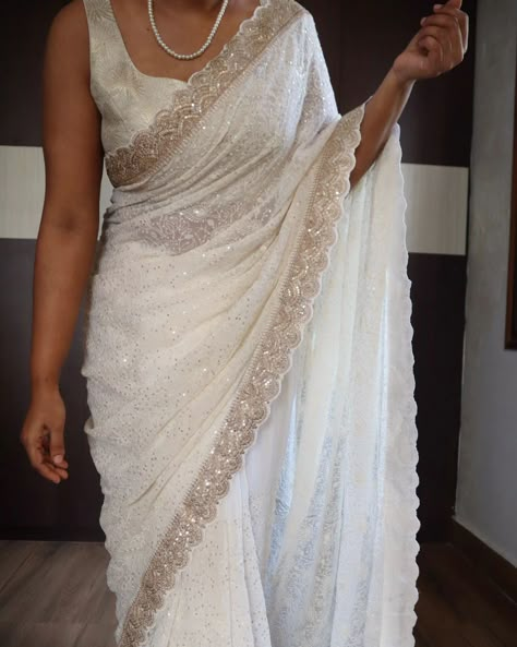 *An adorable chikankari collection with sabyasachi borders in scallop style on pure khaddi georgette silk saree* Pure fabric In elegant pearl white shade Pretty 😍 For ONLY FOR 8000💕💕 Pearl Saree Border, Pearl White Saree, White Saree Bridal Look, Off White Saree Look, Sabyasachi Borders, White Saree Aesthetic, Nepali Clothing, White Saree Look, Saree Blouse Stitching