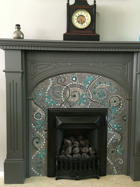 Mosaic fireplace surround made with glass tiles, wall painted with Farrow and Ball Purbeck Stone paint Subway Tile Fireplace, Mosaic Tile Fireplace, Mosaic Fireplace, Fireplace Facing, Fireplace Frame, Gorgeous Fireplaces, Tile Fireplace, Fireplace Tile Surround, Wooden Fireplace