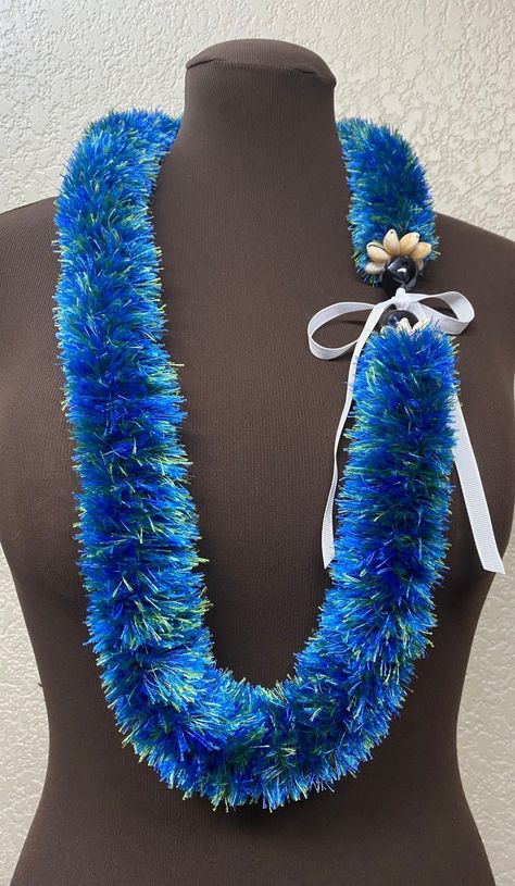 This Accessories item by HandmadeSbyTK has 221 favorites from Etsy shoppers. Ships from Neenah, WI. Listed on Aug 4, 2024 Eyelash Yarn Lei, Yarn Lei, Graduation Leis Diy, Ribbon Lei, Hawaiian Lei, Graduation Leis, Kukui Nut, Eyelash Yarn, Cowrie Shells