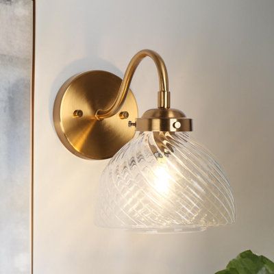 Elevate the ambiance of your refined bathroom, living room, or bedroom with this exquisite 1-light wall sconce. Its captivating electroplated brass finishes beautifully harmonize with the textured dome glass shade, adding a touch of modern luxury to your snug spaces. When paired with Edison bulbs, in can descents, or dimmable led bulbs, this mid-century modern French country bathroom vanity light can be adjusted to your desired brightness. Please note that bulbs and dimmer are not included. | Me Double Vanity Sconces, Modern French Country Bathroom, French Country Bathroom Vanity, Brass Bedroom, French Country Bathroom, Wall Sconces Bedroom, Brass Bathroom, Bathroom Sconces, Bathroom Inspiration Decor