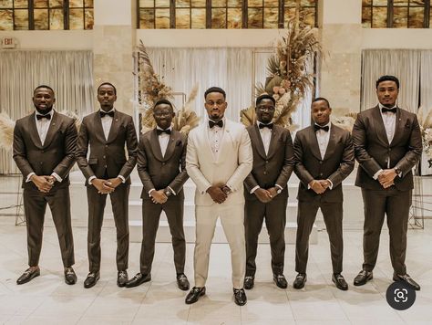 Chocolate Brown Groomsmen Suits, Brown Tux Wedding Party, 2023 Groomsmen Trends, Tan Suit Wedding Black Man, Brown Tux Groomsmen, White And Brown Groom Suit, Champagne And Brown Wedding Colors, Chocolate Brown Wedding Colors, Chocolate Groomsmen Suits