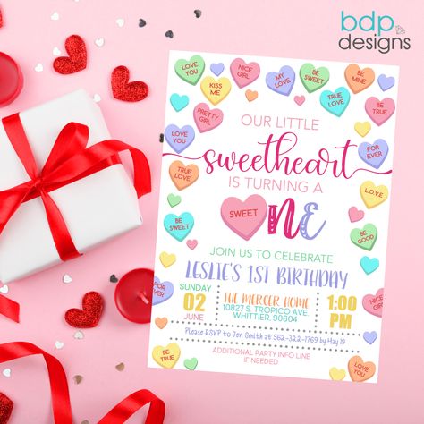 Love is in the Sweet♥️! Celebrate that special Sweet One with this Conversation Heart Invitation! Find it Here!👇 https://www.etsy.com/listing/1646167017/editable-conversation-hearts-1st-first?click_key=e9c01943ee5601118e29e58e3766a654e281d149%3A1646167017&click_sum=1f2d7b56&ref=shop_home_feat_1&pro=1&sts=1 Candy Heart Birthday Party, Sweet Heart Birthday Theme, Candy Heart First Birthday, First Birthday Heart Theme, Conversation Hearts Party, Sweetheart First Birthday Girl, Candy Heart Birthday, February First Birthday Girl, February First Birthday