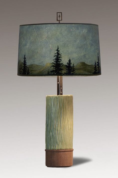 Handcrafted, archival giclee drum shade featuring our Midnight pattern. Shown on our individually hand carved pottery base in old copper glaze, topped with a hand forged, detailed steel extension and finished with a locally turned poplar wood base. Shade is signed, dated, and hallmarked. Pewter finial in a steel oxide finish. Height : 25" Width : 14" Depth : 14" Size : Large Lamp Shade Shape : Drum Lamp Shade Height : 9" Lamp Shade Top Diameter : 14" Lamp Shade Bottom Diameter : 14" Max Incandes Carved Pottery, Large Lamp Shade, Steel Extension, Repurposed Lamp, Large Lamp, Ceramic Lamp Base, Wood Table Lamp, Media Table, Drum Lamp