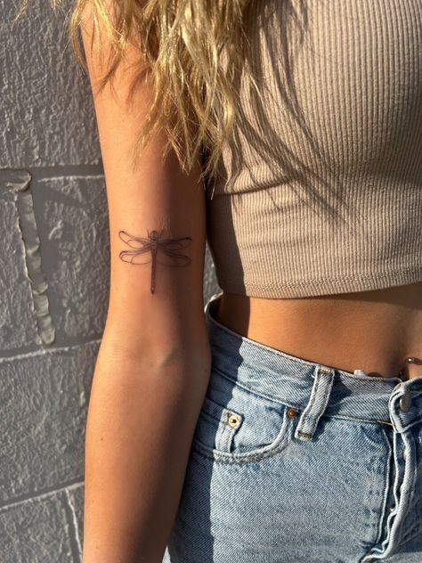 Tattoo Blonde Hair Jeans White Background Dragonfly Tan Dragonfly Bicep Tattoo, Dragonfly Tattoo On Arm, Dragonfly Arm Tattoo, Dragonfly Tattoo Wrist, Dragonfly Tattoo Placement, Dragonfly Tattoo Arm, Dragonfly Tattoo Meaning, Tatted Girl, Dragonfly Fashion