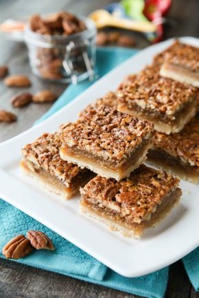 Pecan Pie Bars are made with an easy shortbread crust and delicious pecan pie filling. A crowd-pleasing Thanksgiving or Christmas dessert that will serve many guests. Easy Shortbread Crust, Pistachio Pudding Cookies, Chocolate Pecan Pie Bars, Easy Shortbread, Pecan Pie Filling, Apple Pie Bars, Pecan Bars, Spiced Pecans, Dessert Bar Recipe