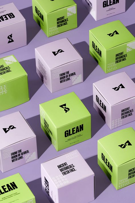 Vertical image of pastel purple and lime green skincare product packaging styled neatly in alternating pattern for Glean photoshoot by Chicago Commercial, Beauty and Fashion Photographer, Olivia Kohler. Green Box Packaging Design, Minimalist Skincare Packaging, Skincare Product Packaging, Supplement Packaging, Minimal Skincare, Green Branding, Green Skincare, Skincare Branding, Green Cosmetics