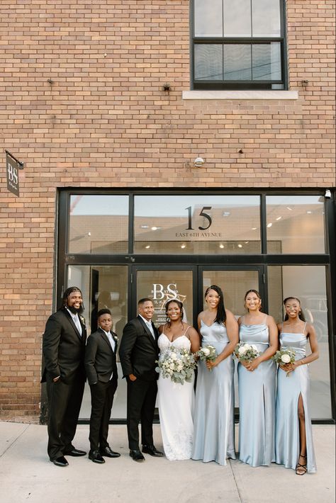 Dusty blue bridal party, black couple Dusty Blue And Black Wedding Party, Black And Dusty Blue Wedding, Dusty Blue And Black Wedding, Dusty Blue Bridal Party, Bridal Party Black, Blue And Black Wedding, Blue Bridal Party, Venue Lighting, Blue Minimalist