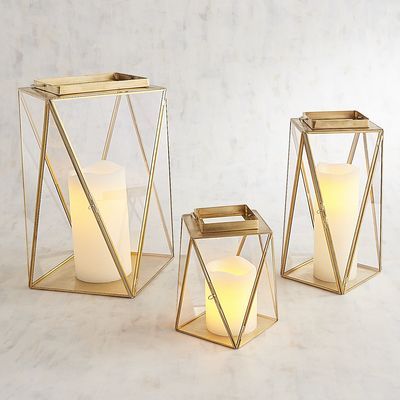 Chloe Golden Modern Lanterns | Pier 1 Imports Lantern Decor Living, Contemporary Candles, Decorative Lanterns, Navy And Copper, Modern Lanterns, Candle Design, Modern Candle, Console Table Decorating, Abstract Forms