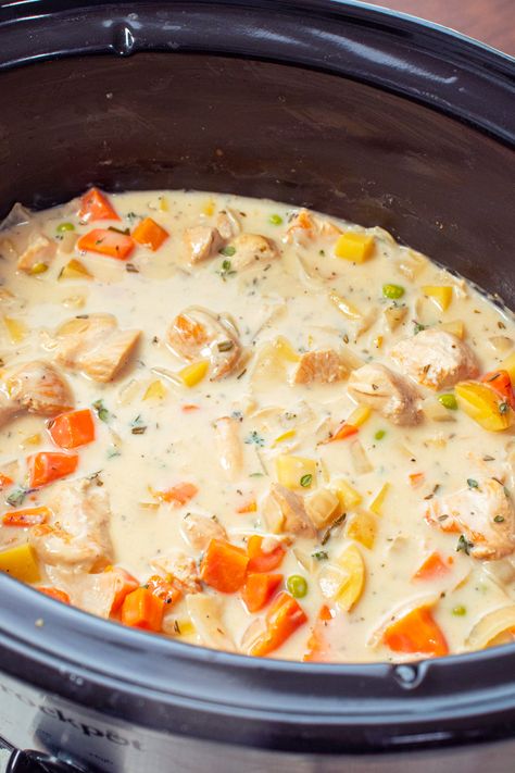 Slow Cooker White Wine Chicken Stew?utm_source=12tomatoes Slow Cooker White Wine Chicken, White Wine Chicken Stew, Chicken Breast Recipes Slow Cooker, Slow Cooker Chicken Stew, Chicken Breast Slow Cooker, White Wine Chicken, Wine Chicken, Crockpot Soups, Cooking With White Wine