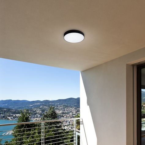 Tartu outdoor ceiling light representing the minimalist style will be a great choice for patio lighting. The round, matte black aluminum fixture is complemented by a white plastic lampshade and has a built-in LED lightsource. The A energy-class smart bulb has a power of 18W, a luminous flux of 1,800 lumens. Tartu can illuminate with cold, natural or warm white light. Balcony Lights, Balcony Lighting, Circle Light, Smart Bulb, Outdoor Ceiling, Led Stripes, Patio Lighting, 3d Modelling, Roof Terrace