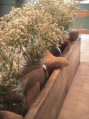 baby's breath filled mason jars in a wooden crate. not babys breath.. I have a bunch of burlap.. Rustic Wooden Box Centerpiece, Wooden Box Centerpiece, Wood Box Centerpiece, Jars Ideas, Rustic Wood Box, Rustic Wooden Box, Burlap Garland, Rustic Valentine, Tafel Decor