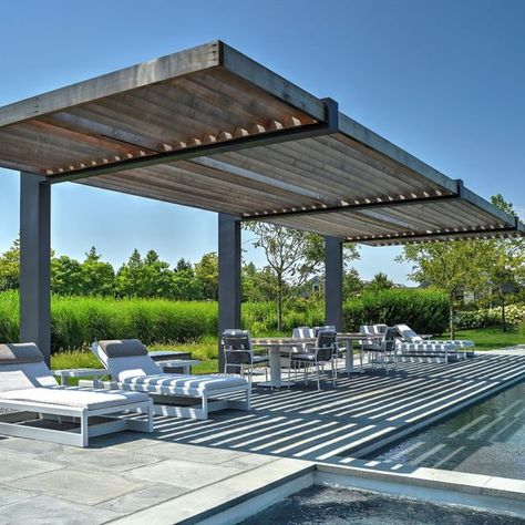 Davis Landscape Design on Instagram: "Poolside structures like the pergola create a sense of place, anchoring the pool area with a functional space for entertaining, dining or lounging. . With it's simple clear lines and strong stature, this pergola works particularly well against the loose texture of the meadow landscape behind the pool area. . We work closely with our clients through the design process to ensure successful installations. New technologies are emerging with exciting new opport Pergola Pool Ideas, Pool Side Pergola Ideas, Poolside Dining Area, Pool Shade Structure, Poolside Structures, Floating Pergola, Pergola Over Pool, Pool Pergola Ideas, Pergola Poolside