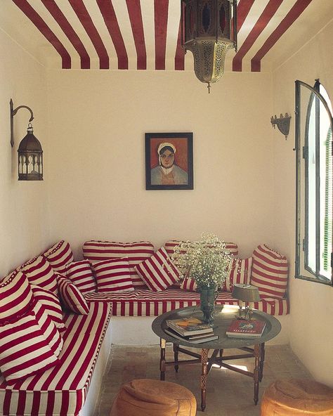 THE WORLD OF INTERIORS on Instagram: “Candy striped ceiling and banquette in Decorator Gavin Houghton’s Tangier Riad. Photography @roland_beaufre. From our December 2017 issue.…” Striped Ceiling, Portugal House, Striped Couch, Moore House, Sea House, Striped Room, The World Of Interiors, Flat Ideas, Colourful Living Room