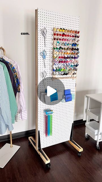 Angelina | Upcycled Fashion on Instagram: "Here’s what I used to make my mobile pegboard 👇🏾

1. 1 sheet of peg board from @homedepot cut down to 2”x6” sheets
2. 2 - 2x3”x 8’ studs cut at 6 feet
3. 4 shelf angles
4. 4 plate caster wheels

Since I was able to get all the wood cut at Home Depot, the only tool I needed was a drill.  4 hours later I had a mobile peg board thread wall. Yippee!  This is perfect for a sewing room or tool shop.

What do you think?

And I’ll leave a 🔗 to my Houston sewing classes in my Stories.
•
•
•
#diy #sewing #pegboard #sewingroom #sewingroomorganization #toolshop #learntosew #sewingforbeginners #beginnersewing #diycrafts #craftroom #diyorojects #isew #imakemyownclothes #sewsewsew #blackmakersmatter" Sewing Pegboard, Mobile Pegboard, Art Stations, Pegboard Craft Room, Peg Board Walls, Sewing Closet, Peg Wall, Sewing Room Decor, Sewing Room Organization