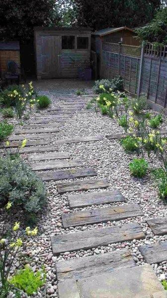 Top 50 Best Wooden Walkway Ideas - Wood Path Designs Garden With Gravel, Reka Bentuk Landskap, Wellness Sanctuary, Stone Garden Paths, Pebble Garden, Ancient Healing, Walkway Landscaping, Medicinal Garden, Desain Lanskap