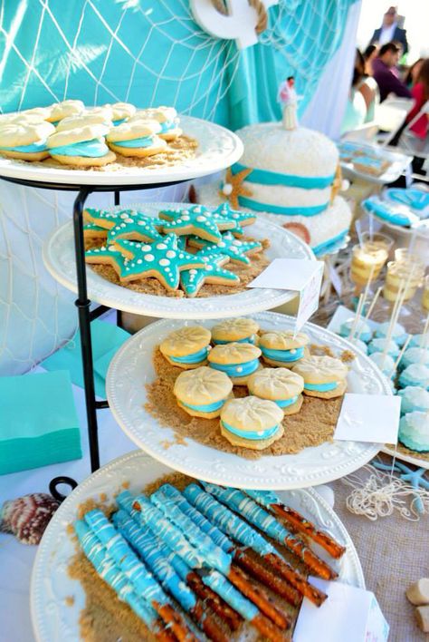 Dessert table-beach theme #seashells #starfish #oystercookies Beach Wedding Dessert Table, Beach Theme Desserts, Beach Theme Birthday, Ocean Birthday Party, Beach Baby Showers, Beach Themed Wedding, Mermaid Theme Birthday Party, Beach Birthday Party, Beach Table