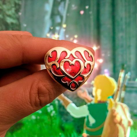 3D molded zinc with a red transparent enamel. [...]Read More... Heart Container, Wolf Craft, Heart Enamel Pin, Cross Stitch Beginner, Skull Pin, Gothic Crosses, Zelda Breath Of The Wild, Beautiful Wolves, 3d Heart