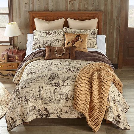 Saddle up for style and get ready to embark on a wild west adventure with the donna sharp cowboy cotton quilt set. This striking bedding ensemble captures the rugged spirit of the frontier with its captivating whole cloth design. Featuring sketched cowboy figures, graceful horses, and iconic cacti set against a desert landscape backdrop, the cowboy quilt set transforms your sleeping space into a western oasis. With a color palette of rich chestnut brown and soft cream, this quilt set evokes the warmth and earthy charm of the desert landscape. This bedding ensemble serves as a captivating reminder of the untamed beauty of the American southwest. 100% cotton, 50/50 cotton/poly fill. Prewashed to prevent shrinkage and fading. Machine wash cold, do not bleach, tumble dry low. Each set includes Cowboy Quilt, Western Quilts, Western Rooms, Western Bedding, Bed Ensemble, Cotton Quilt Set, Cloth Design, Inspire Me Home Decor, The Cowboy