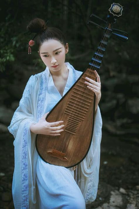 CHINESE INSTRUMENTS Asian Instruments, Chinese National Costume, Chinese Musical Instruments, Chinese Instruments, Playing Instrument, National Costume, Fantasy Novel, China Art, Historical Art