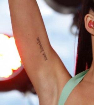 Katy Perrys arm Sanskrit tattoo - see what it says at:  http://www.popstartats.com/katy-perry-tattoos Arm Tattoos With Meaning, Katy Perry Tattoos, Tattoo Placement Arm, Inner Arm Tattoos, Tool Tattoo, Tattoo Unique, Yoga Tattoos, Sanskrit Tattoo, Inner Arm Tattoo