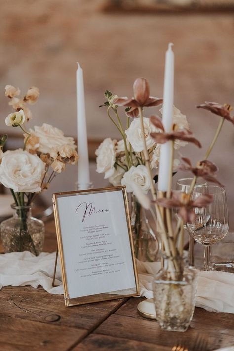 White taper candles in gold candleholders with pale pink and white wedding flowers with a menu stationery in a gold photo frame His And Hers Table, Wedding Dress With Split, Wedding Stationery Ideas, Neutral Wedding Decor, Wedding Candles Table, Place Cards Wedding, Stationery Ideas, Vow Books, Wedding Types