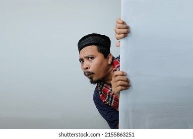 Curious Man Peeking Behind Wall Stock Photo 2155863251 | Shutterstock Peeking Behind Wall Pose, Person Peeking Around Corner, Curious Pose Reference, Peeking Around Corner, Portait Pose, Poem Illustration, Corner Drawing, Curious People, Drawing Help