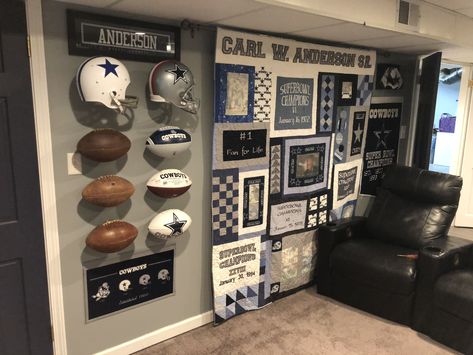 Football Themed Man Cave, Man Cave Memorabilia Display, Football Man Cave Ideas Basement, Sports Theme Game Room, Sports Memorabilia Office, Sports Theme Man Cave, Sports Themed Office Ideas, Sports Room Ideas Man Caves, Football Display Ideas