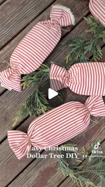 Alyssa Fossett on Instagram: "Easy oversized peppermint DIY using candy dishes from dollar tree and extra fabric! Added these to my front porch garland last year. ❤️🤍

#peppermint #gingerbread #diy #dollartree #budgethomedecor #crafts #easycrafts #christmas #christmasdecor #dollartreediy" Burlap Peppermint Sticks Diy, Peppermint Candy Tray, Front Porch Garland, Gingerbread Ornaments Diy, Peppermint Candy Crafts, Porch Garland, Gingerbread Diy, Peppermint Sticks, Holiday Craft