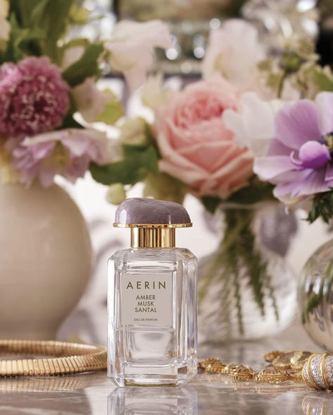 New Amber Musk Santal brings the glowing warmth of a moment by the fireplace filled with the scent of Sandalwood and blooming roses.  #AERIN #AERINBeauty #AmberMuskSantal Amber Musk, By The Fireplace, The Fireplace, Blooming Rose, July 4, Amber, Fireplace, Roses, In This Moment