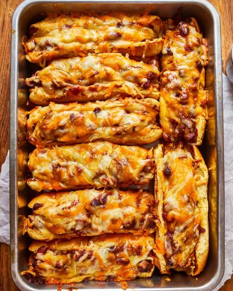 These Baked Chili Dogs on a sheet pan are the best ever! These chili cheese dogs are topped with the best hot dog chili. Baked Chili Dogs, Best Hot Dog Chili, Best Hot Dog Chili Recipe, Chili Dog Recipe, Chili Cheese Dog Bake, Chili Dog Bake, Chili Dog Chili Recipe, Baked Chili, Chili Cheese Dog Casserole