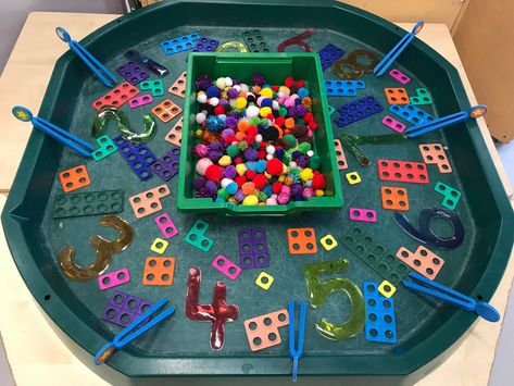 EYFS Maths - numicon counting finger gym with Pom poms and tweezers Maths Tough Tray Eyfs, Eyfs Maths Ideas, Easy Tuff Tray Ideas Eyfs, New Years Eyfs Activities, Maths Table Eyfs, Number Tuff Tray Eyfs, Tuff Spot Ideas Eyfs, Reception Maths Activities, Finger Gym Ideas