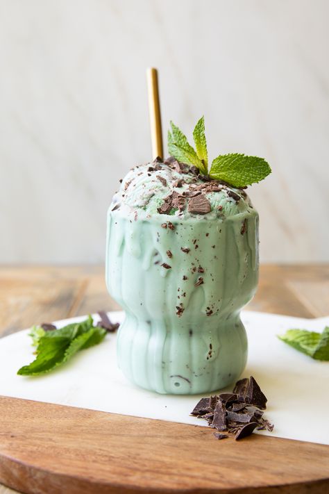 Mint chocolate chip ice cream in a glass. Healthy Mint Chocolate Chip Ice Cream, Healthy Homemade Ice Cream, Peach Popsicles, Jar Of Lemons, Ice Cream Videos, 1 Million Views, Mint Chip Ice Cream, Mint Chocolate Chip Ice Cream, Protein Ice Cream