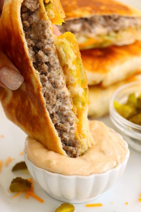 Big Mac Crunch Wrap - Kitchen Divas Big Mac Crunch Wrap Recipe, Hamburger Crunch Wrap, Big Mac Crunch Wrap, Big Mac Egg Rolls, Saturday Night Dinner Ideas, Crunch Wrap Recipe, Big Mac Wrap, Homemade Big Mac Sauce, Saturday Night Dinner